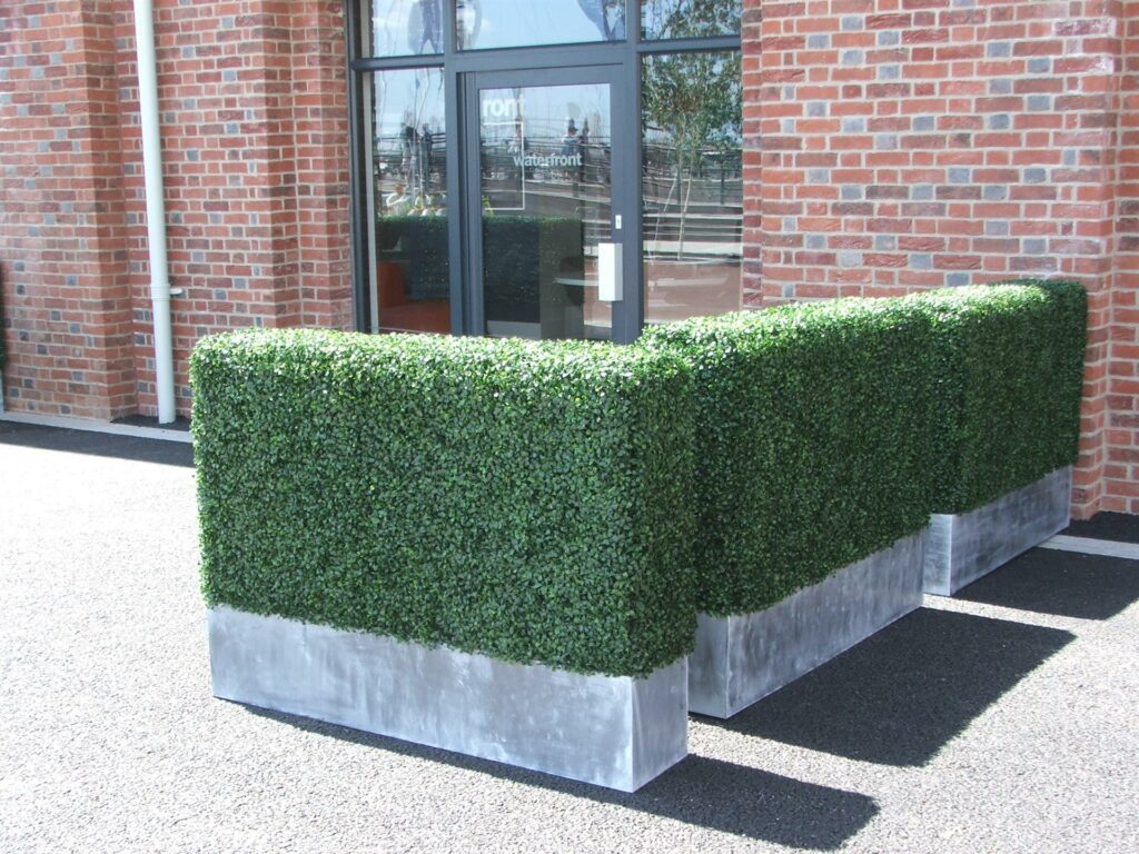 Embracing Artificial Boxwood: Premium Grass Blades’ Green Solution